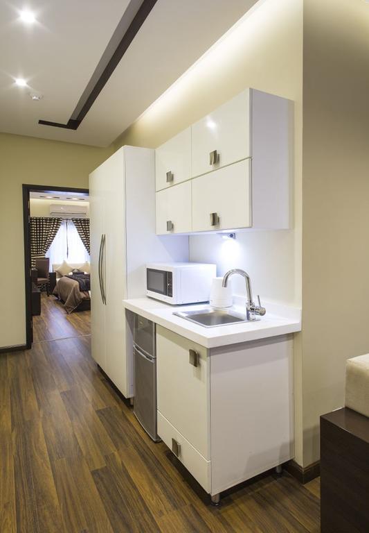 Royaute Luxury Suites And Hotel Gulberg Lahore Zimmer foto